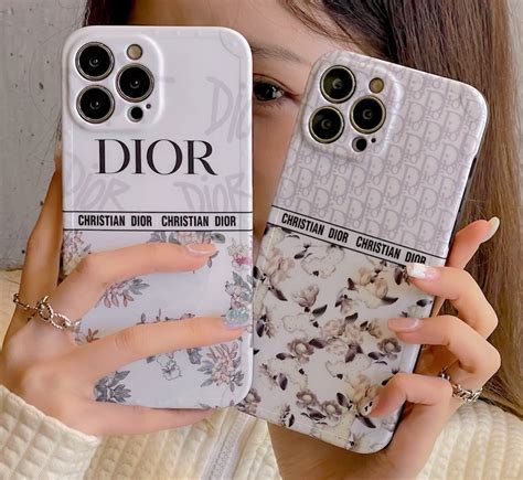 dior coque|Dior phone holder.